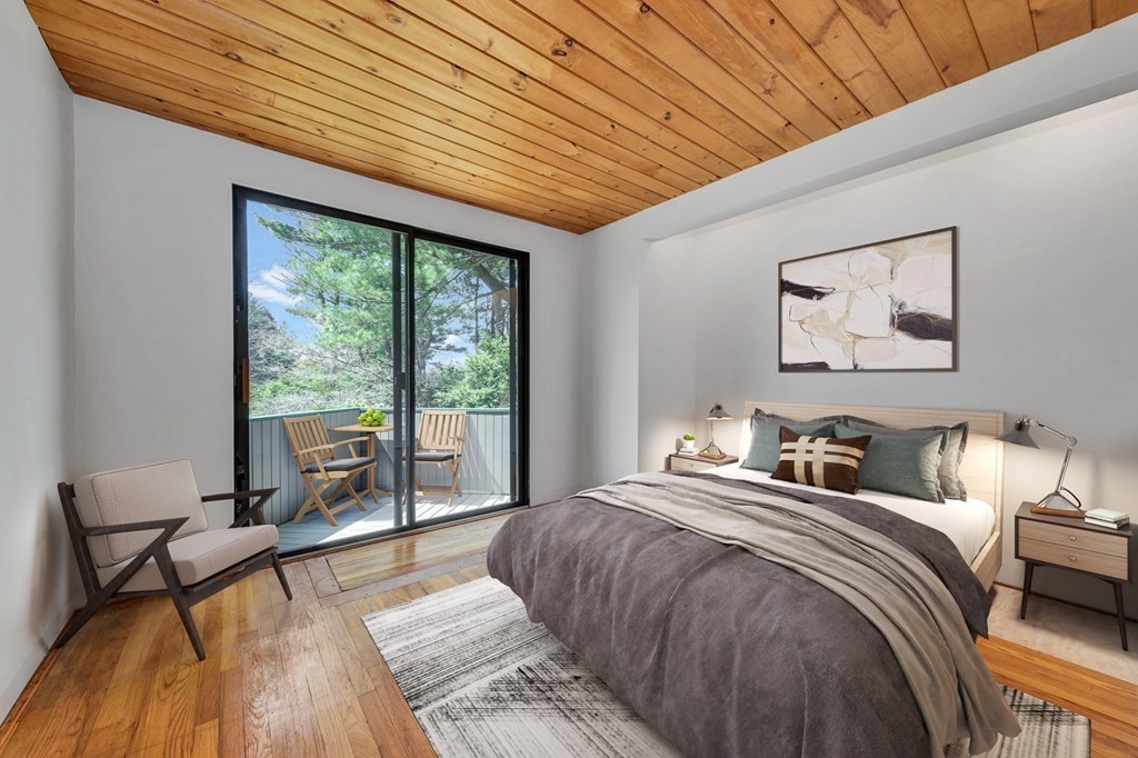 2 Field Road Lexington, MA 02421 - Photo 18 of 32 a bedroom with furniture and a large window