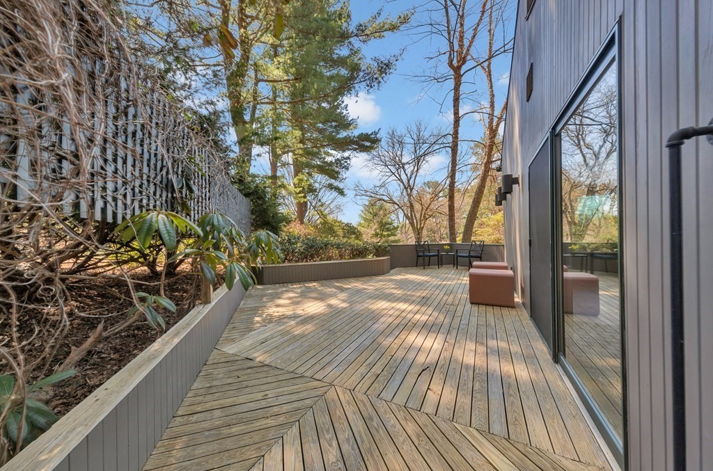 2 Field Road Lexington, MA 02421 - Photo 19 of 32 a view of a balcony with wooden floor