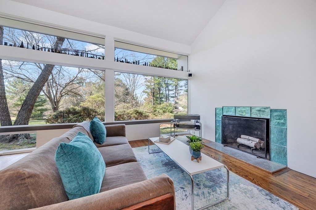 2 Field Road Lexington, MA 02421 - Photo 2 of 32 a living room with furniture and a fireplace