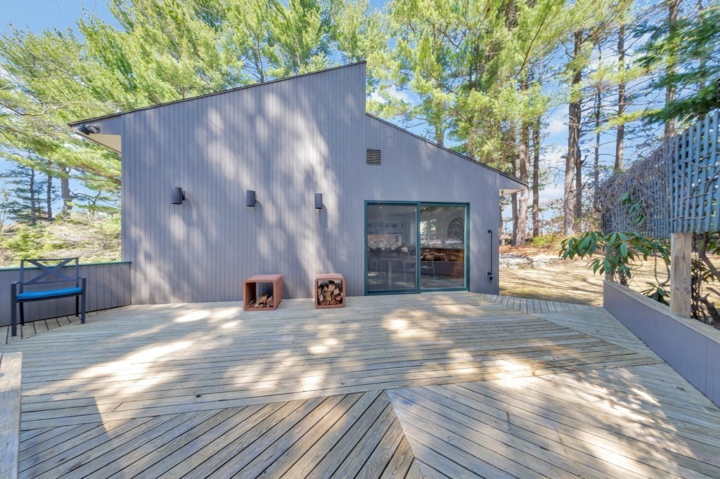 2 Field Road Lexington, MA 02421 - Photo 21 of 32 a view of a house with backyard and sitting area