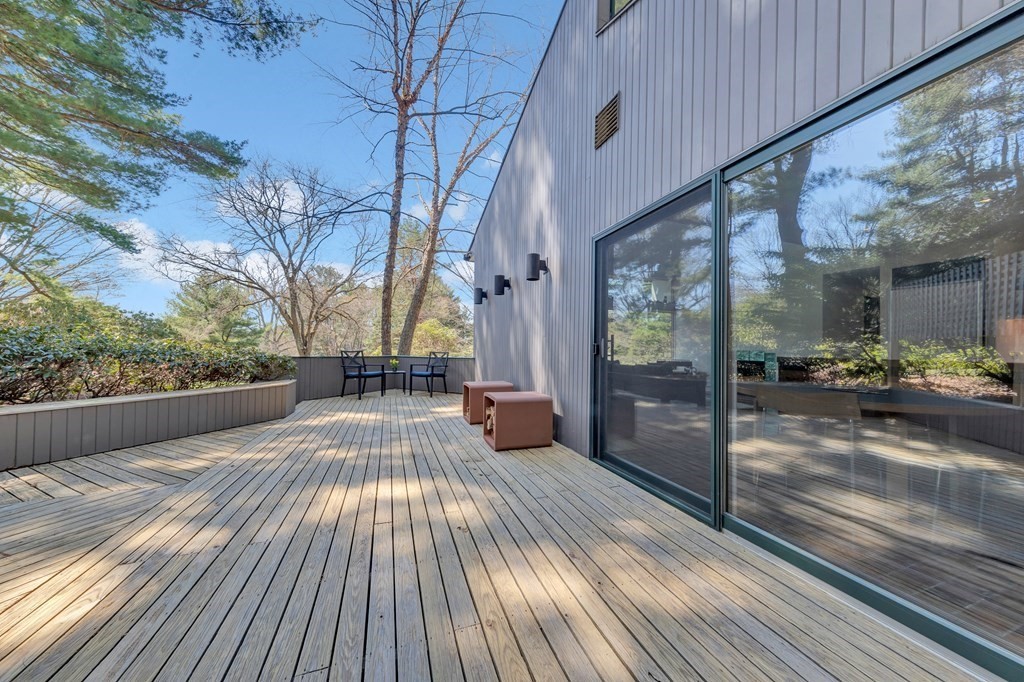 2 Field Road Lexington, MA 02421 - Photo 22 of 32 a view of a room with wooden floor