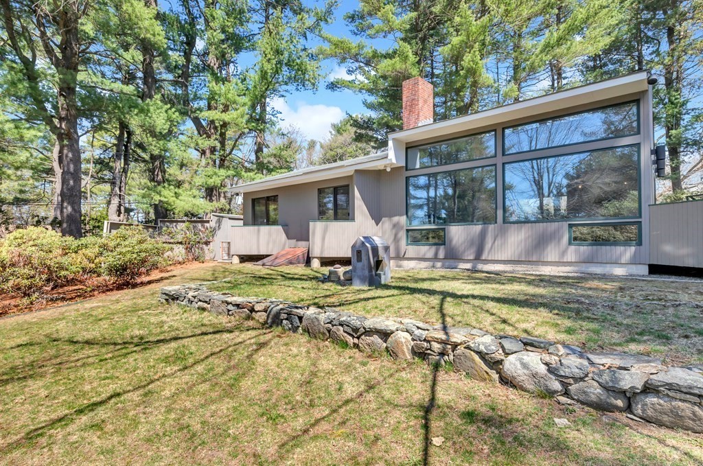 2 Field Road Lexington, MA 02421 - Photo 25 of 32 a view of a house with backyard and sitting area