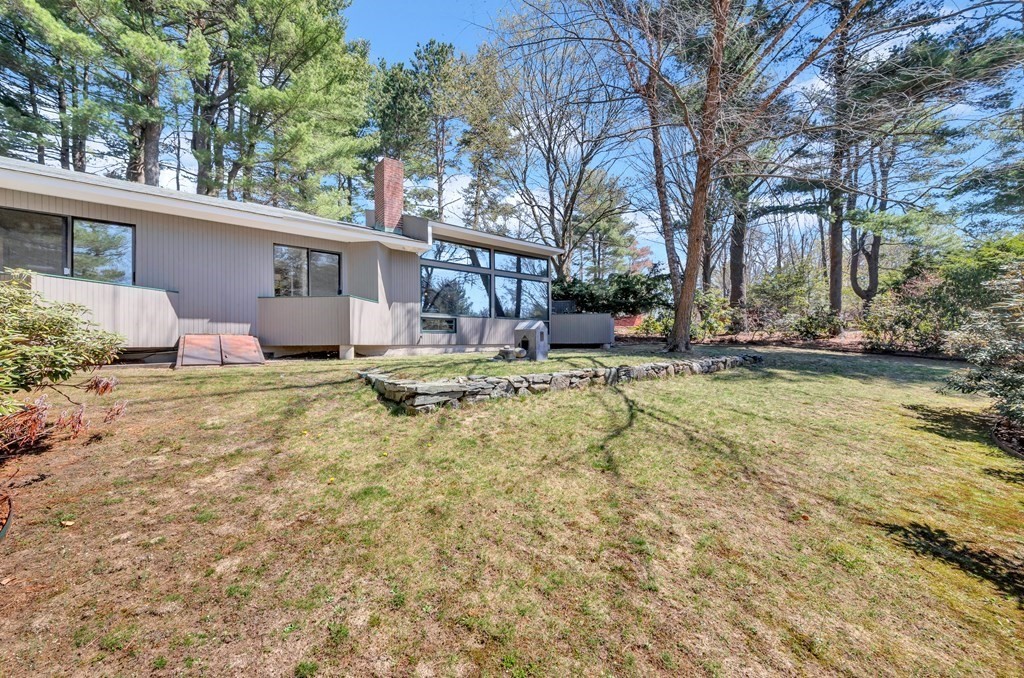 2 Field Road Lexington, MA 02421 - Photo 26 of 32 a view of a house with a yard covered in snow