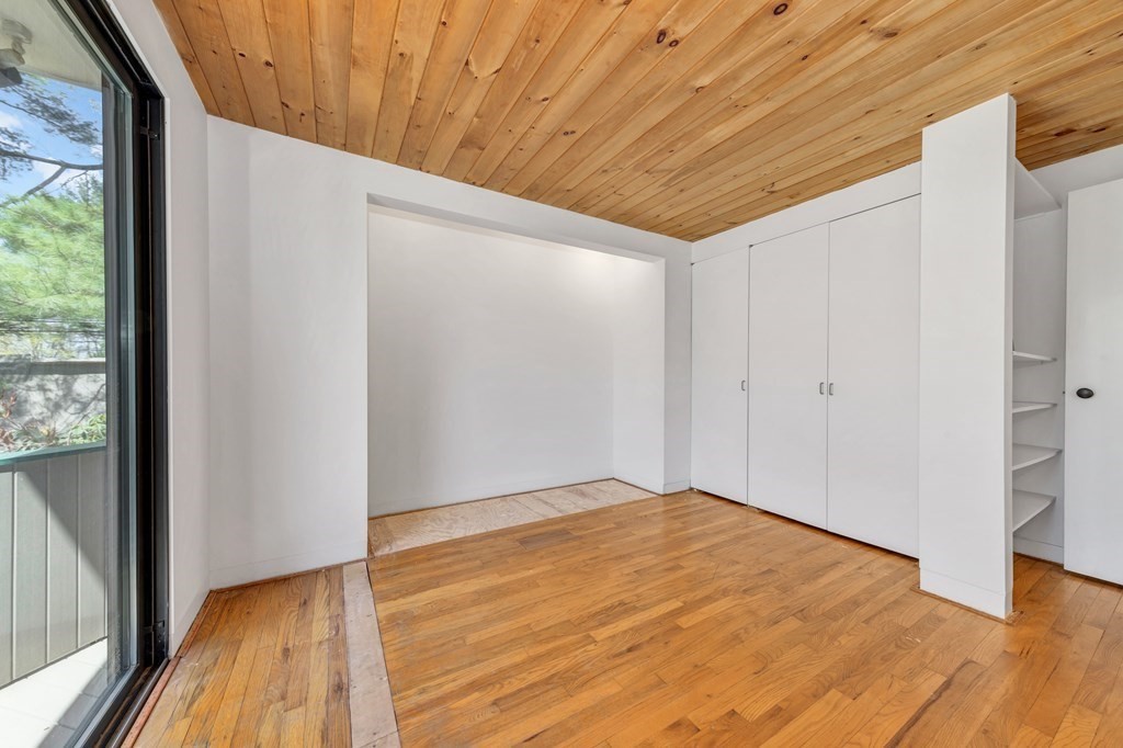 2 Field Road Lexington, MA 02421 - Photo 30 of 32 a view of empty room with wooden floor