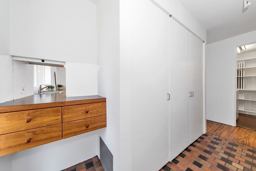 2 Field Road Lexington, MA 02421 - Photo 3 of 32 a room with bed and cabinets