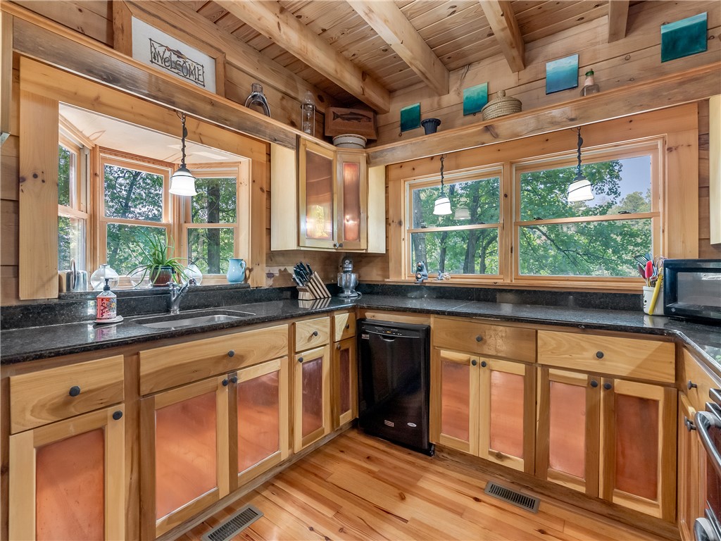 555 Chattooga Lake Road Mountain Rest, SC 29664 - Photo 11 of 45 Kitchen with copper accented doors.