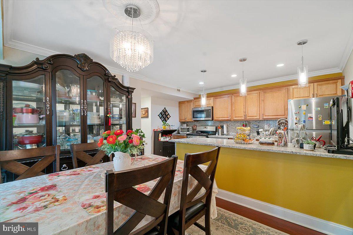 3730 Bel Pre Road, Unit 37302 Silver Spring, MD 20906 - Photo 8 of 22 Dining Room Opens into the Kitchen!