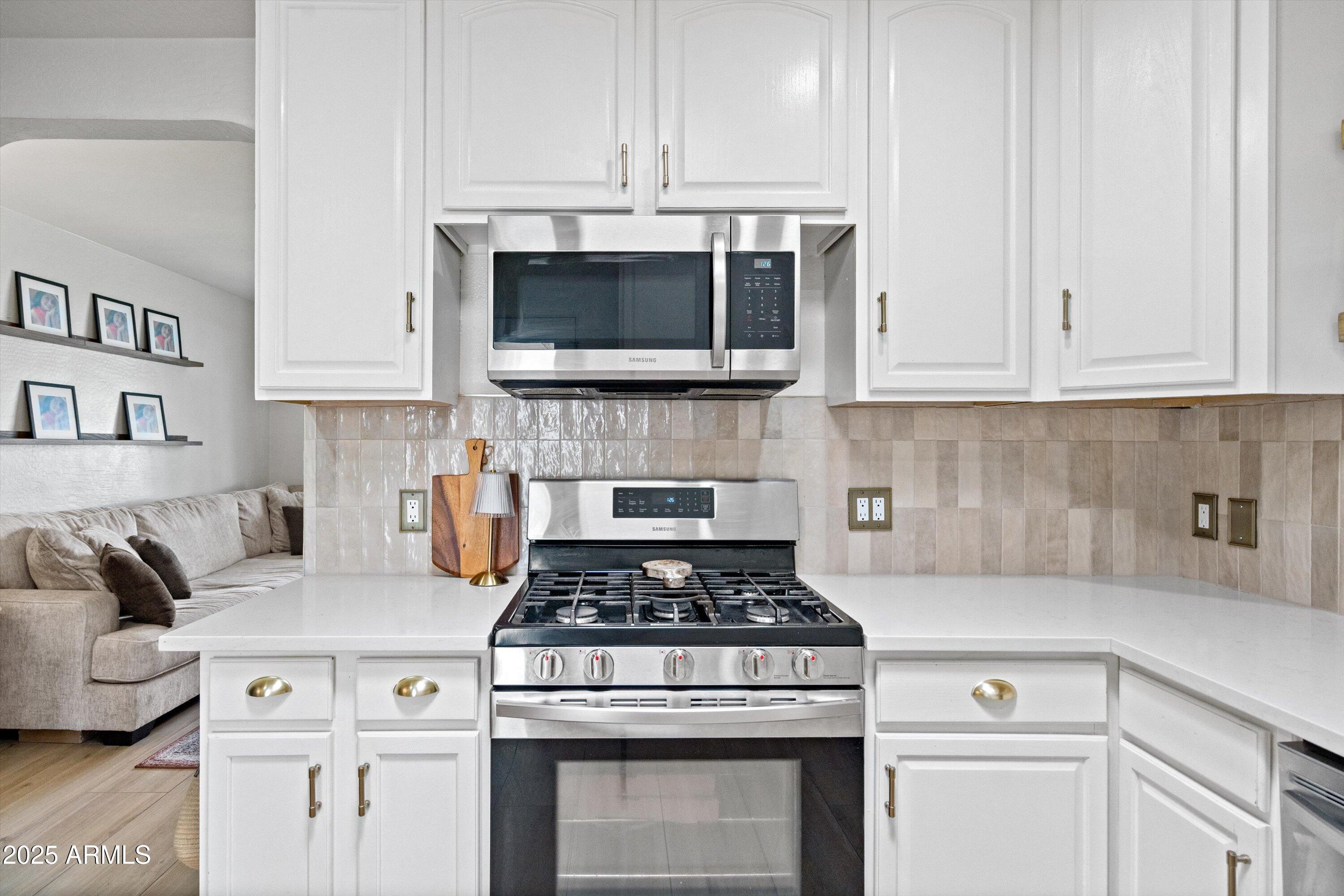 2201 East Weldon Avenue Phoenix, AZ 85016 - Photo 13 of 41 a kitchen with cabinets appliances and a sink