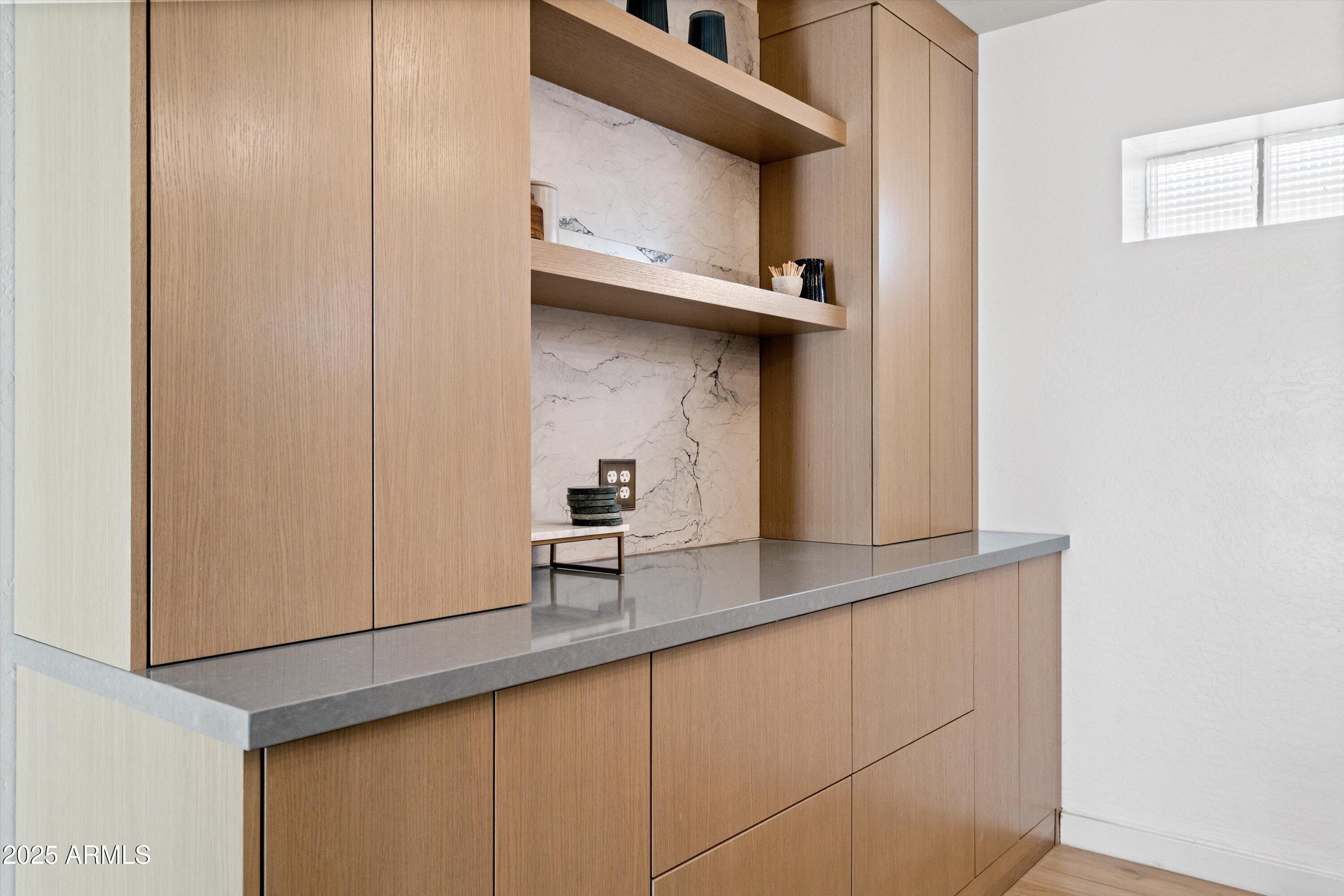 2201 East Weldon Avenue Phoenix, AZ 85016 - Photo 20 of 41 a kitchen with a sink and cabinets