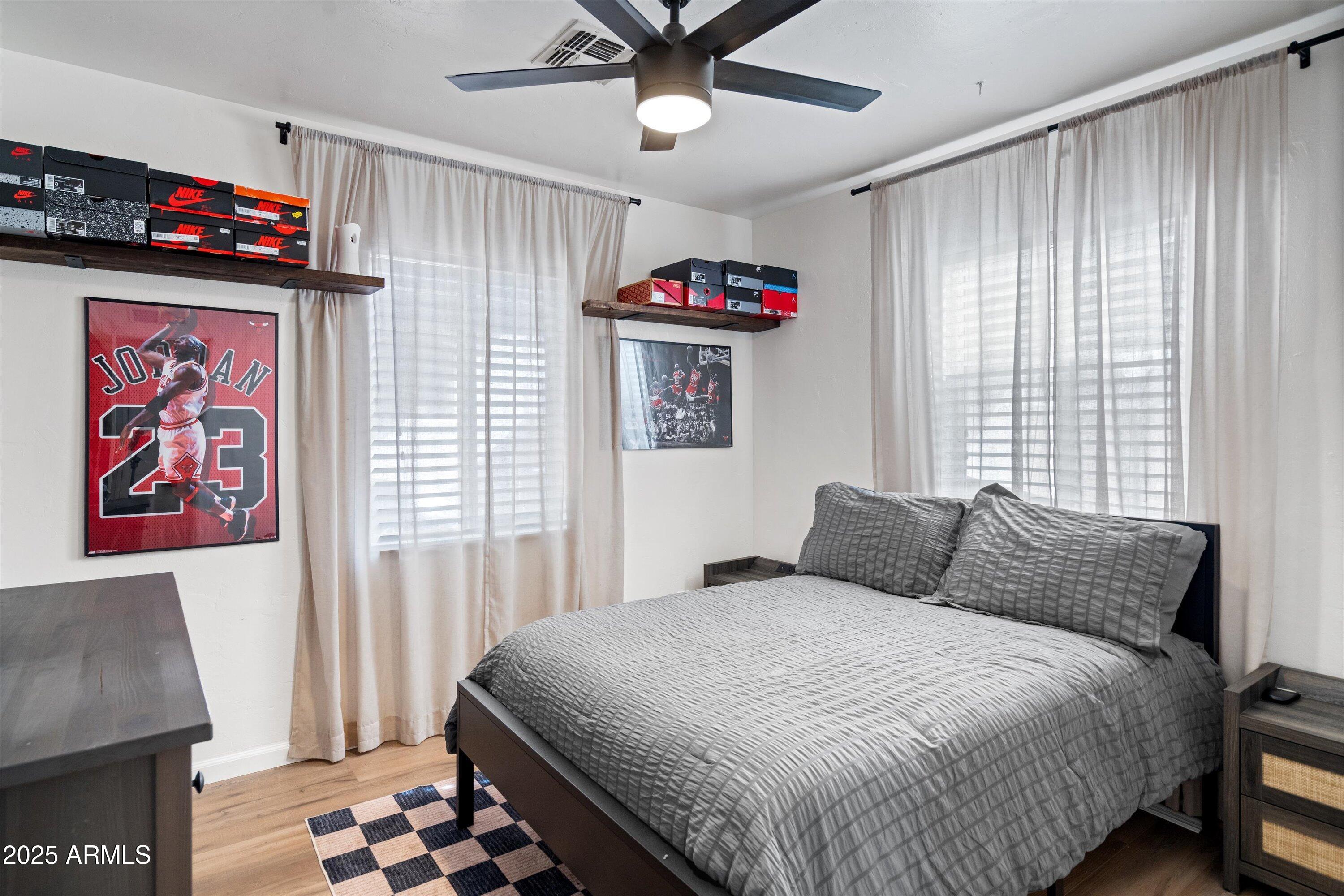 2201 East Weldon Avenue Phoenix, AZ 85016 - Photo 26 of 41 a bedroom with a bed and a window