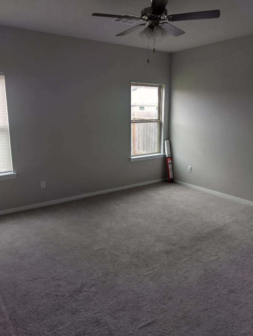 24807 Russet Bluff Trail Houston, TX 77336 - Photo 4 of 6 an empty room with a window