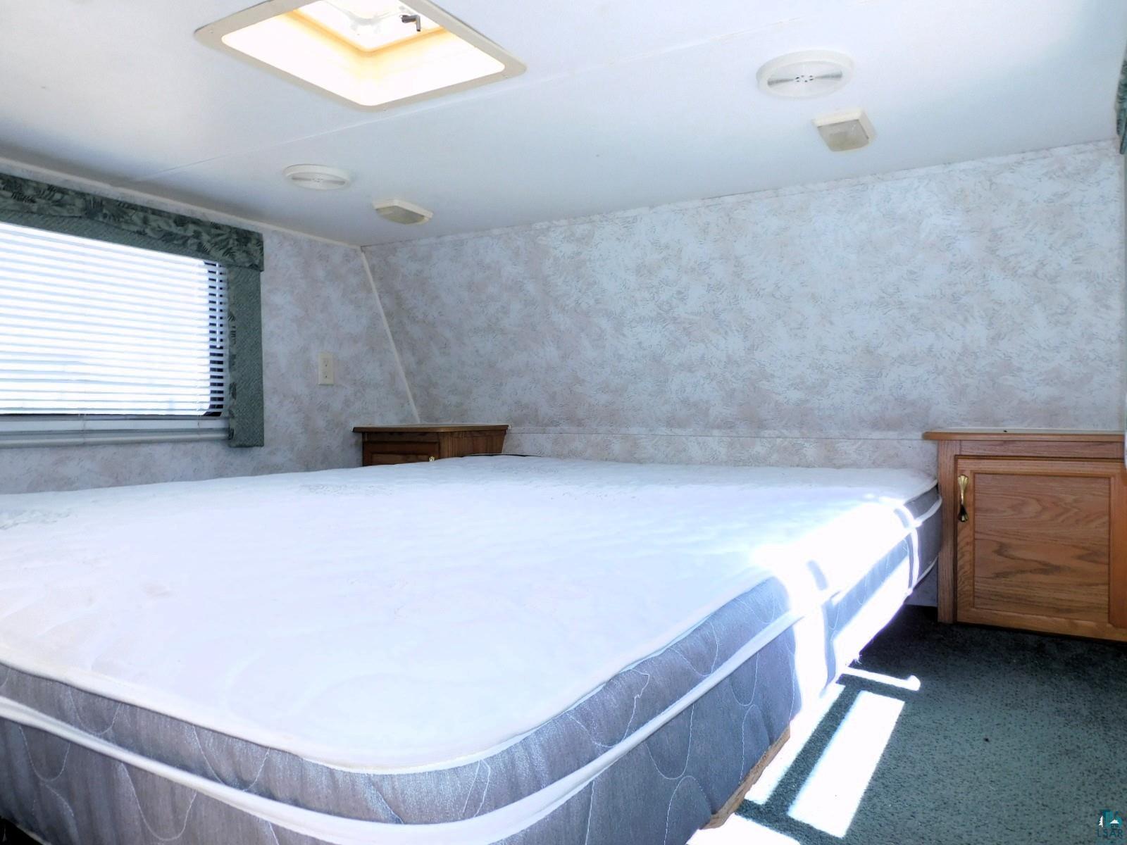 85-xxx Fireplace Road Port Wing, WI 54865 - Photo 17 of 37 Queen size bed