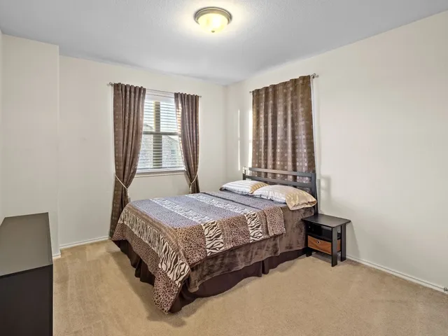 a bathroom with a sink double vanity and mirror