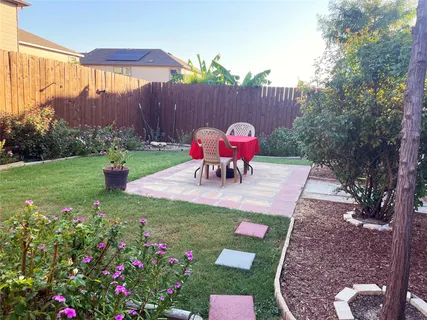 a view of a wooden deck with a bench