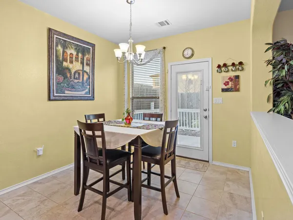 a kitchen with stainless steel appliances kitchen island granite countertop a sink and cabinets