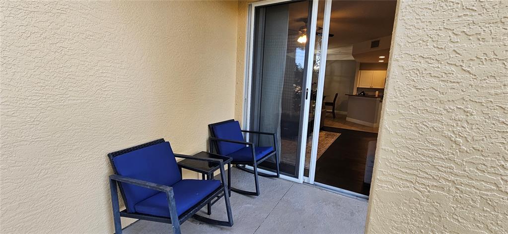 1502 Southwest 50th Street, Unit 104 Cape Coral, FL 33914 - Photo 15 of 18 a view of a elevator with sitting area