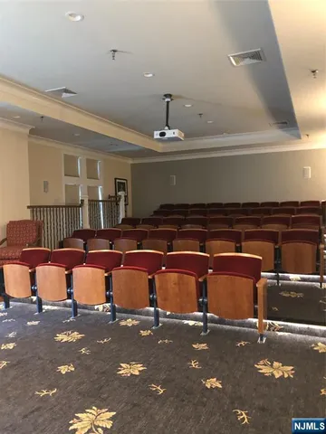 a living room with furniture and a lamp