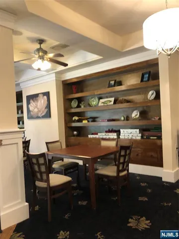 a view of a workspace with furniture