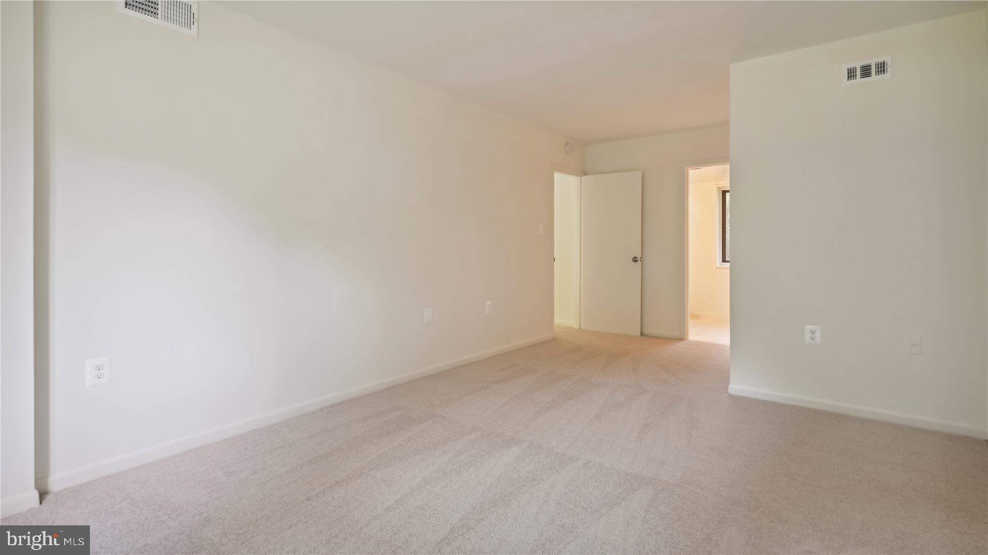 1429 Northgate Square, Unit 1C Reston, VA 20190 - Photo 11 of 25 Primary Bedroom to Living