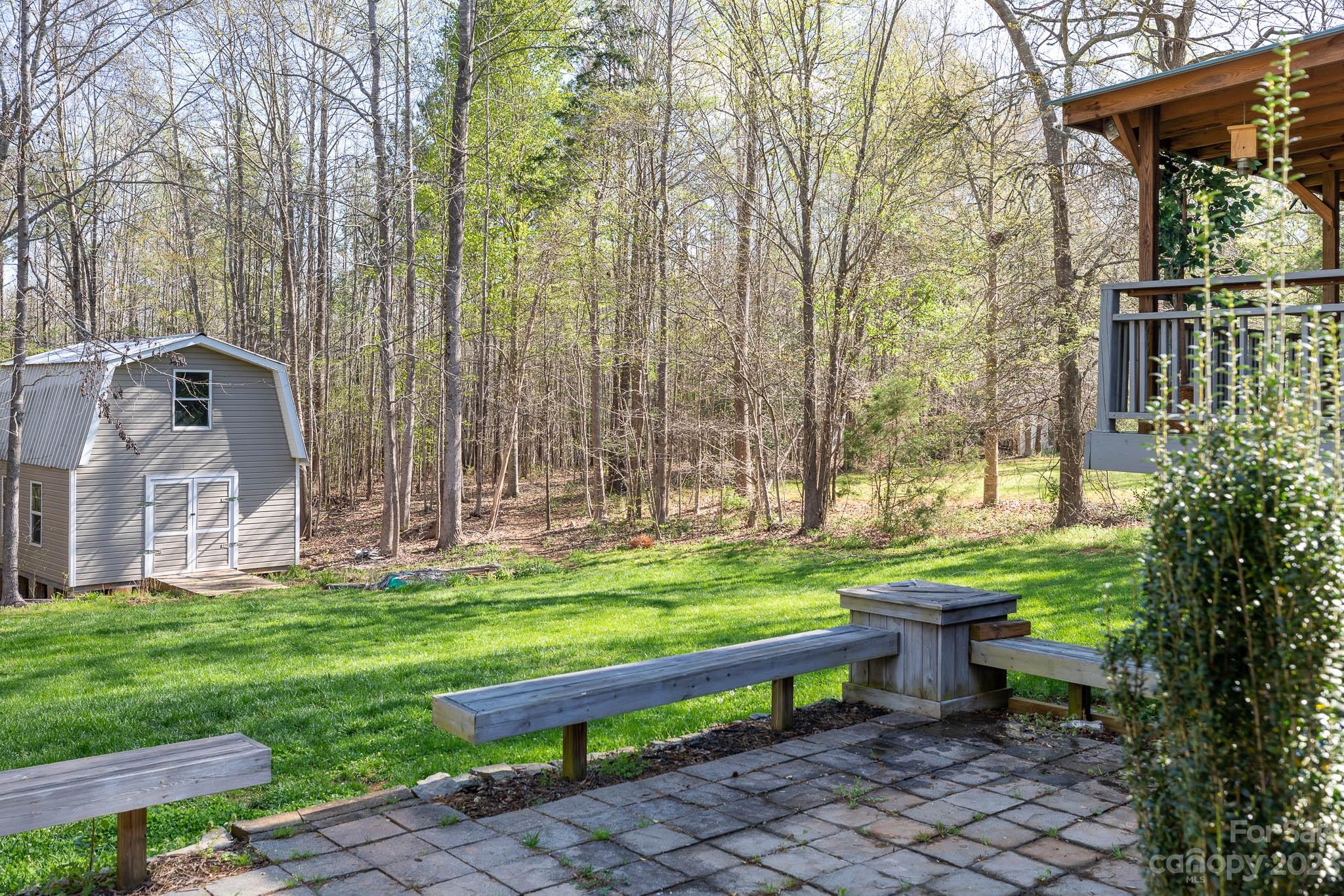 1503 George Dunn Road Rock Hill, SC 29730 - Photo 17 of 21 a backyard of a house with table and chairs