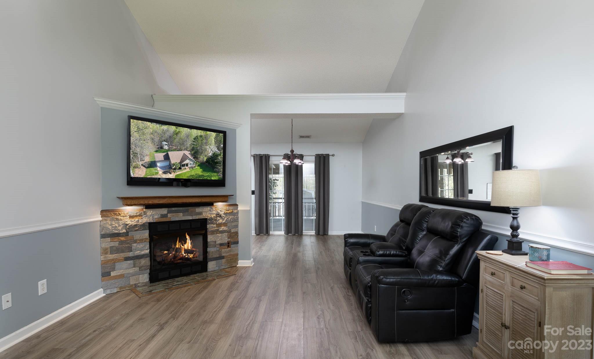 1503 George Dunn Road Rock Hill, SC 29730 - Photo 2 of 21 a living room with furniture and a flat screen tv