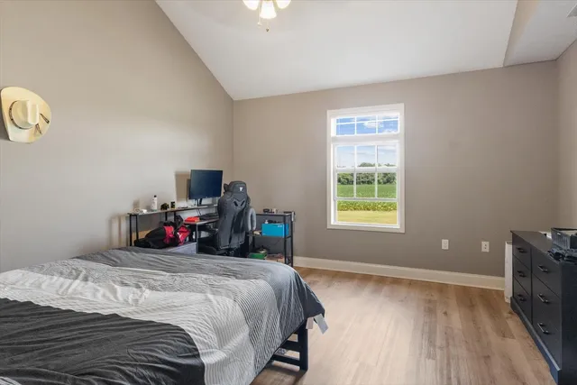 a bathroom with a sink a toilet and shower curtain