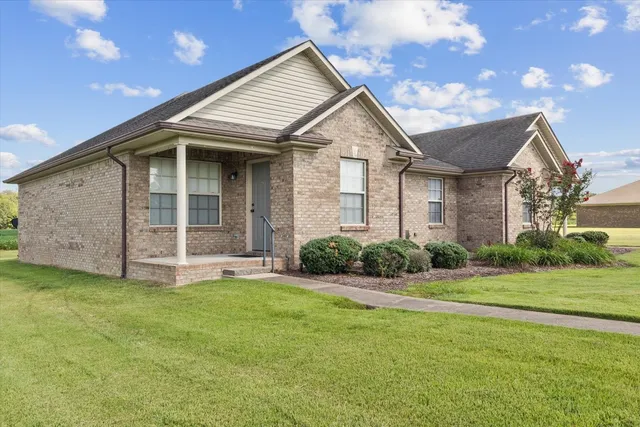 a view of a house with a big yard