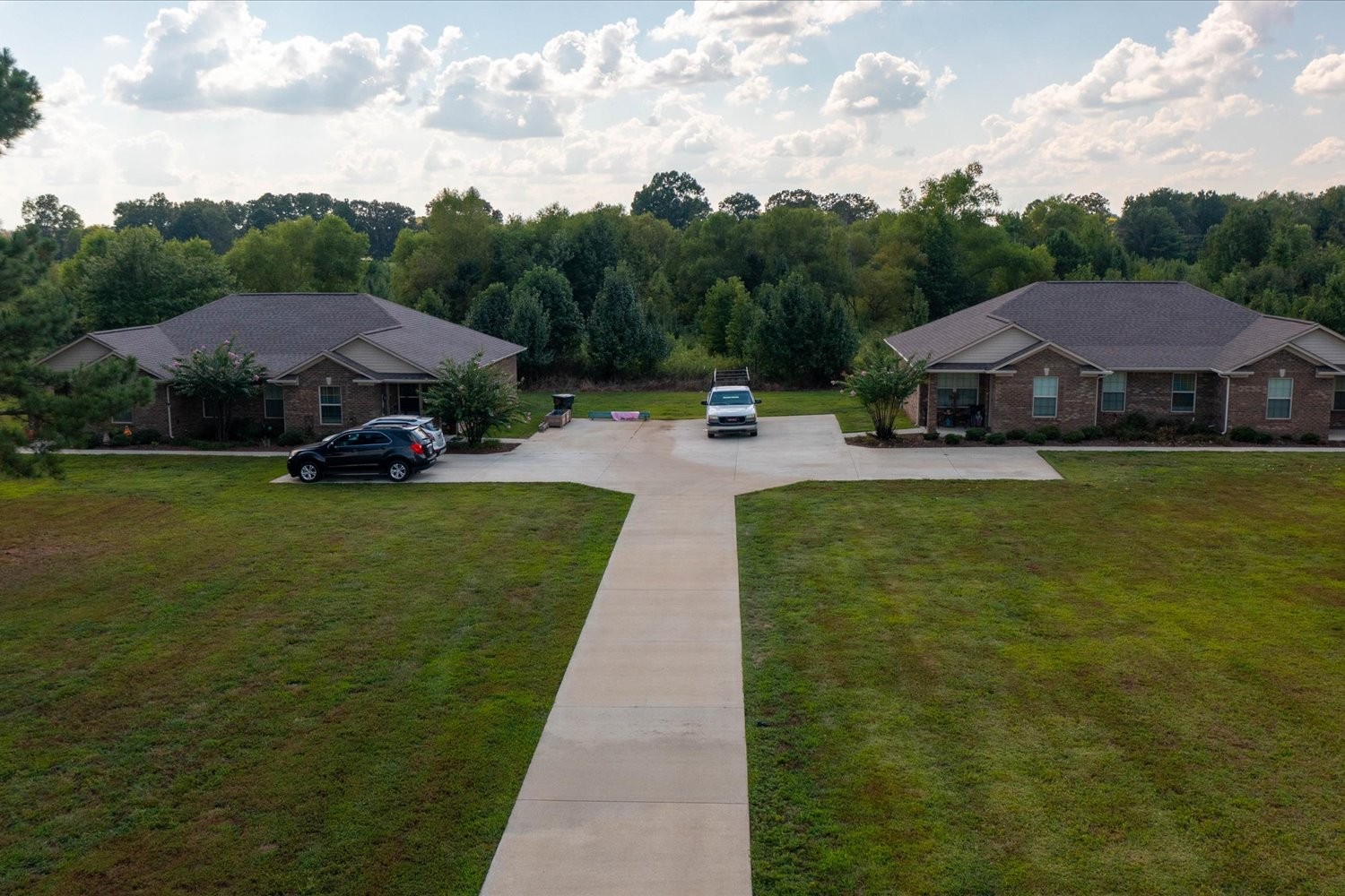 56 Mattox Road Lawrenceburg, TN 38464 - Photo 5 of 54 a view of house with garden and trees