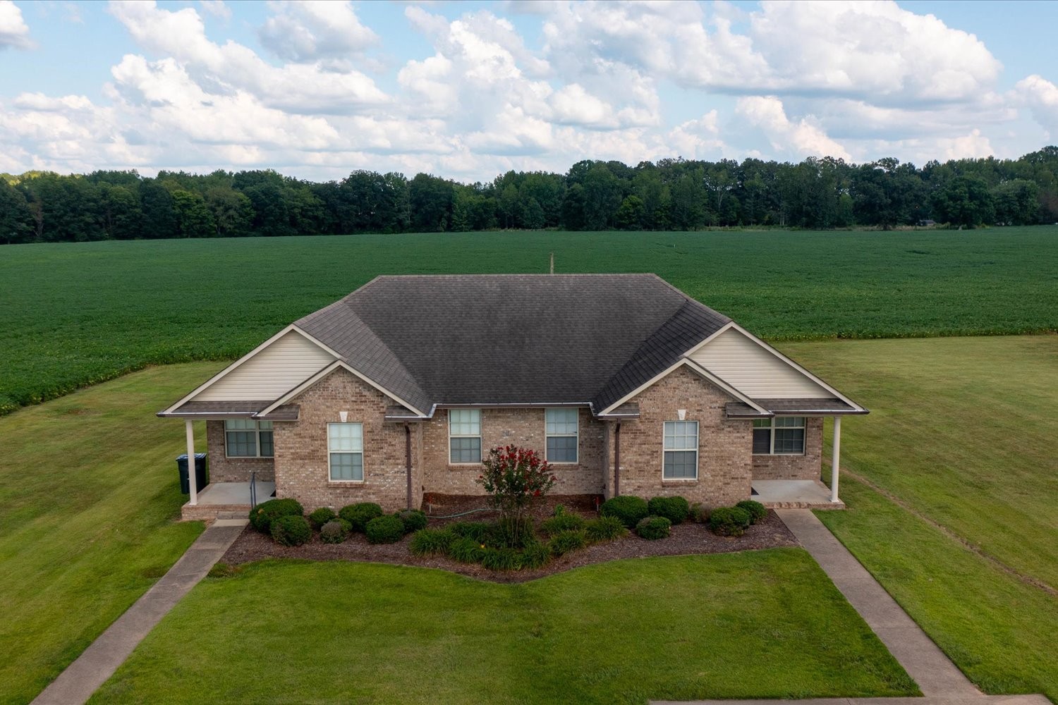 56 Mattox Road Lawrenceburg, TN 38464 - Photo 6 of 54 a aerial view of a house next to a yard and big trees