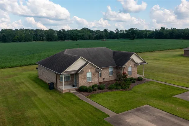 a view of a terrace with yard