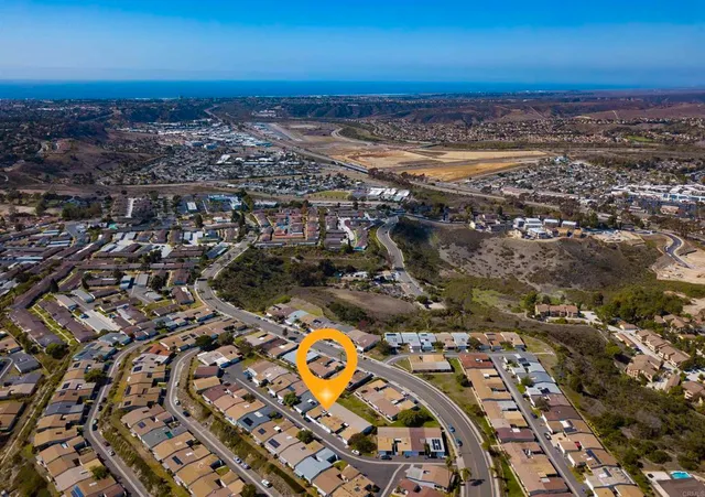an aerial view of multiple house