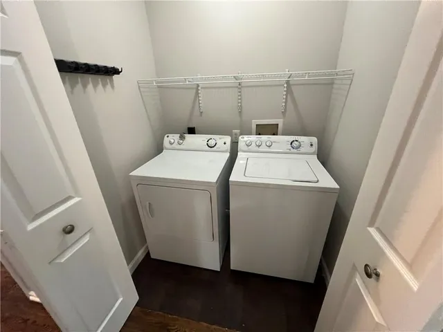 a kitchen with a sink stainless steel appliances and refrigerator
