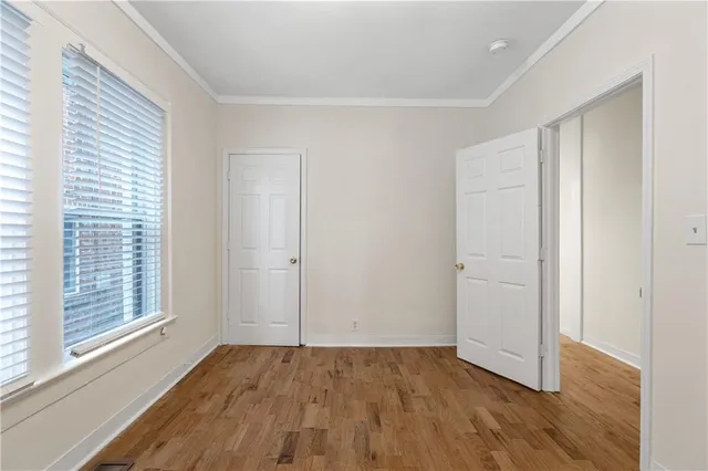 a bathroom with a shower and a sink