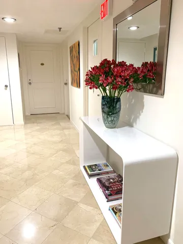 a dining room with table and chairs