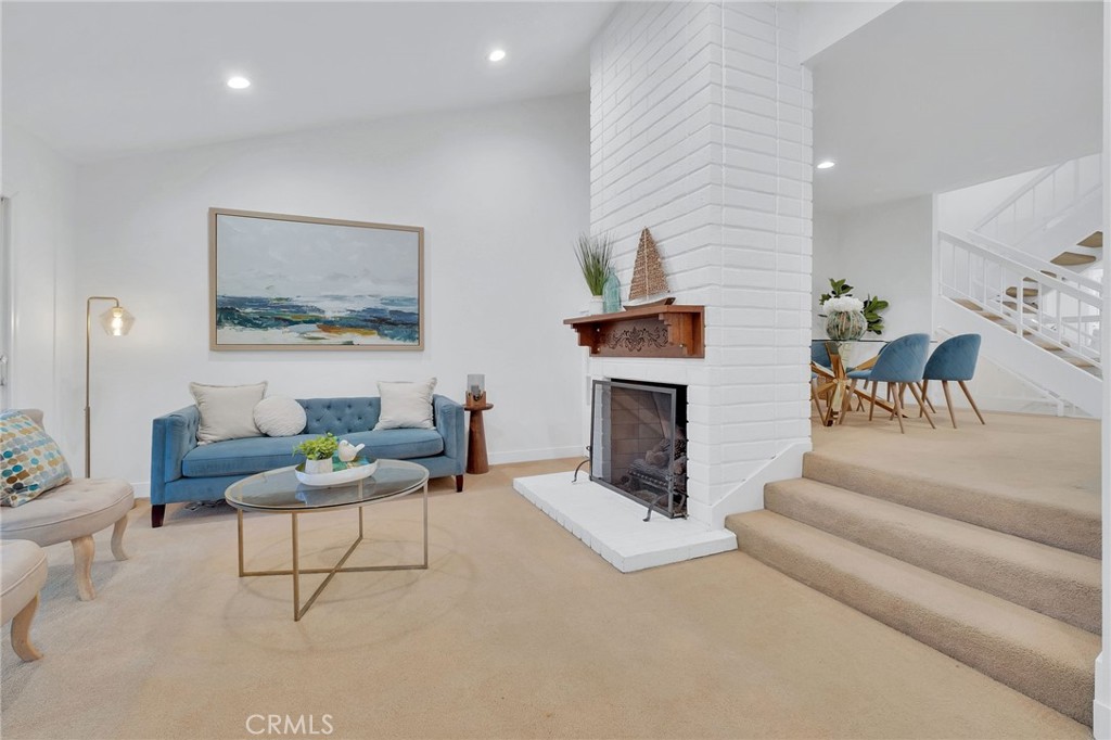 28207 Ridgepoint Court Rancho Palos Verdes, CA 90275 - Photo 10 of 65 Living room with valted ceiling and gas fireplace