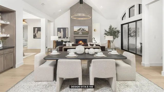 a dining room with furniture window and wooden floor