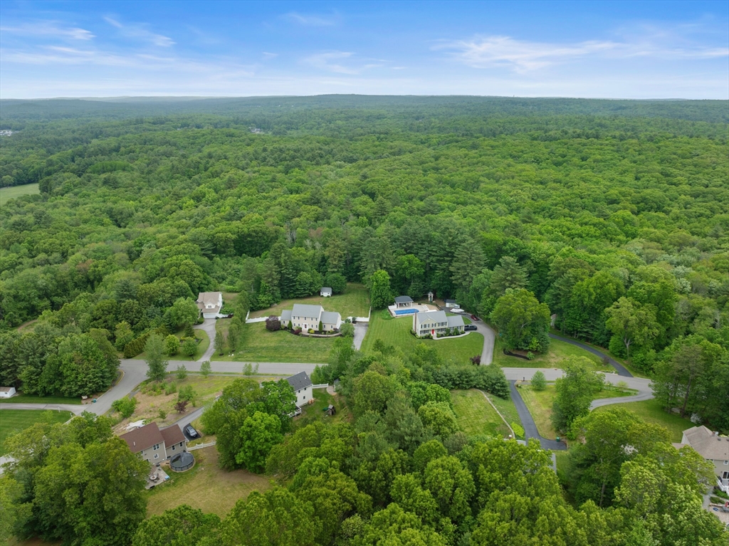 55 Arbor Road Uxbridge, MA 01569 - Photo 11 of 12 a view of a city with lush green forest