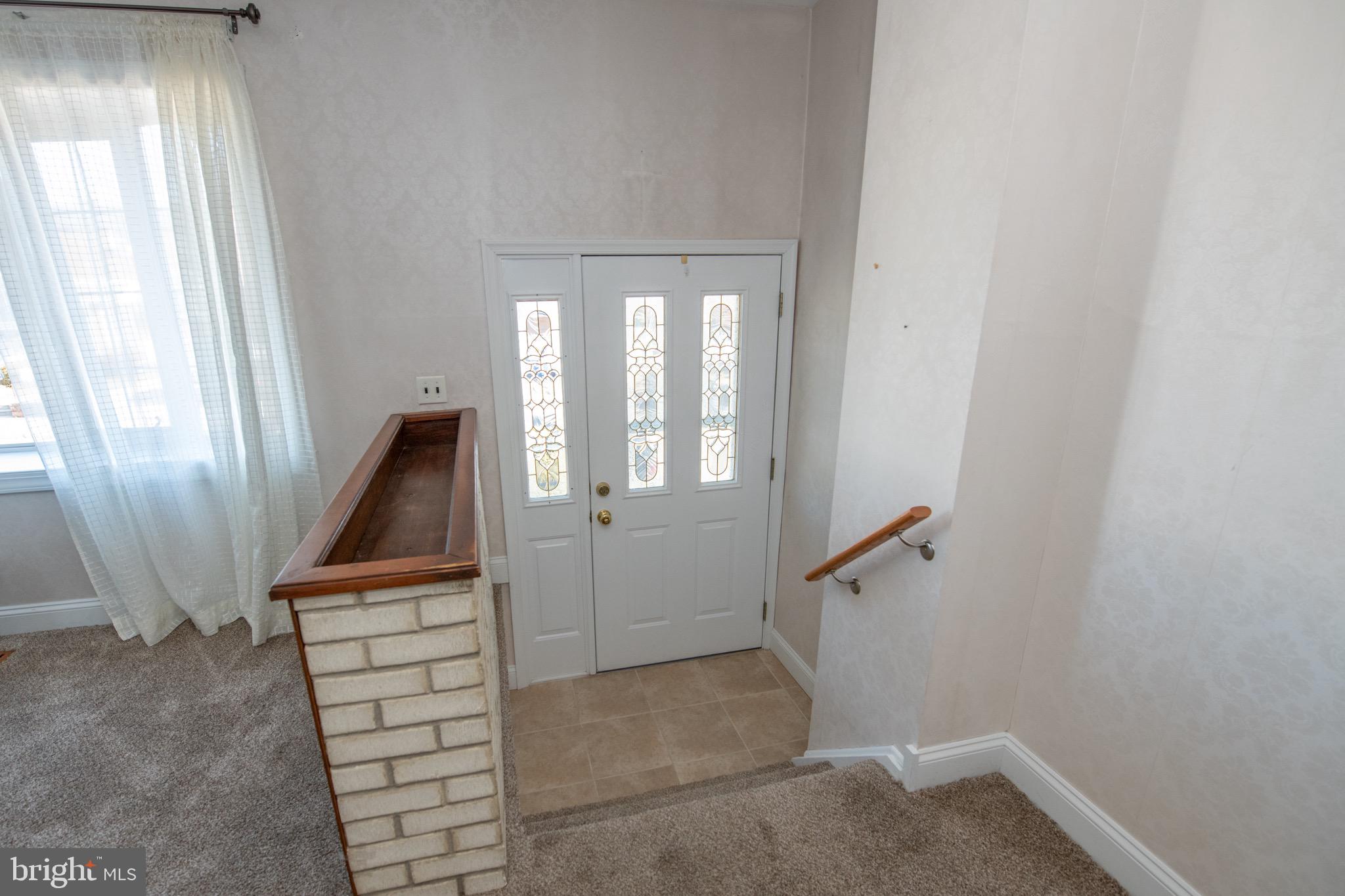 3210 Ancona Road Philadelphia, PA 19154 - Photo 25 of 46 wooden floor in an empty room with a window