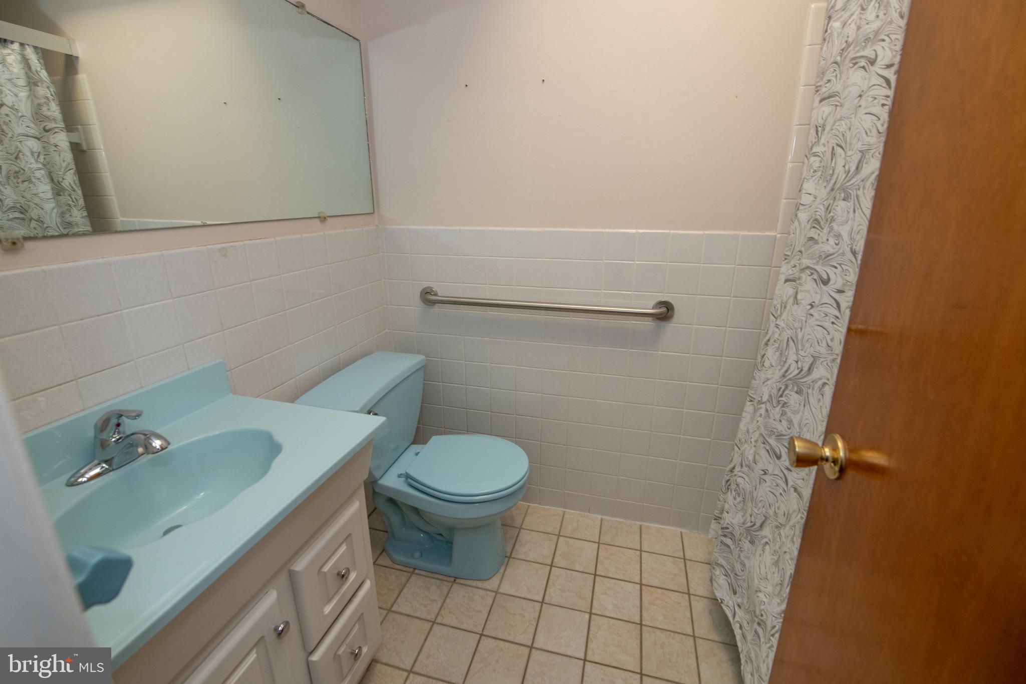 3210 Ancona Road Philadelphia, PA 19154 - Photo 26 of 46 a bathroom with a sink and a toilet