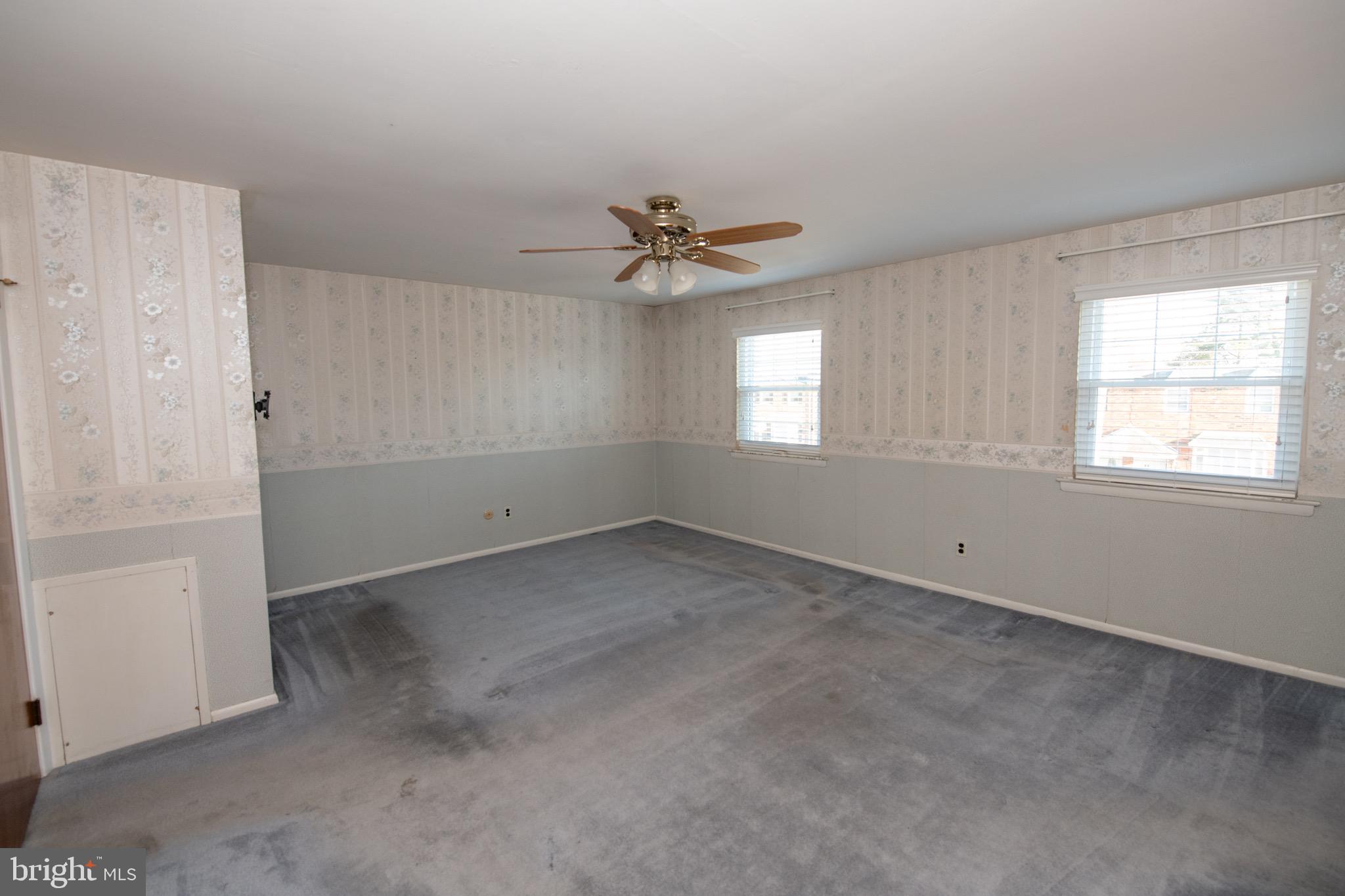 3210 Ancona Road Philadelphia, PA 19154 - Photo 29 of 46 an empty room with windows and closet