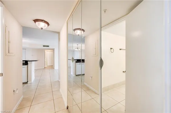 a bathroom with a shower and a mirror