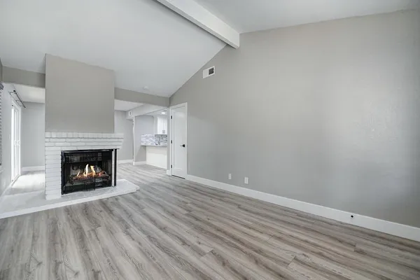 a view of kitchen island wooden floor
