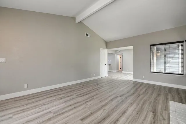a bathroom with a sink vanity and a mirror