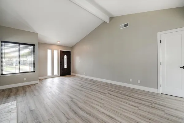 a bathroom with a shower and a toilet