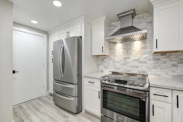 a backyard of a house with lots of green space