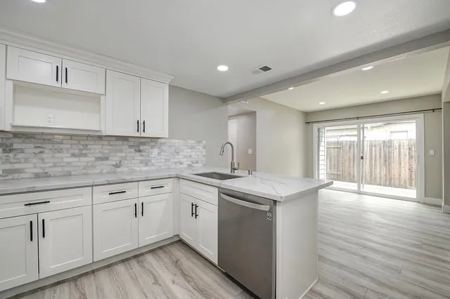 a view of a backyard with a garden