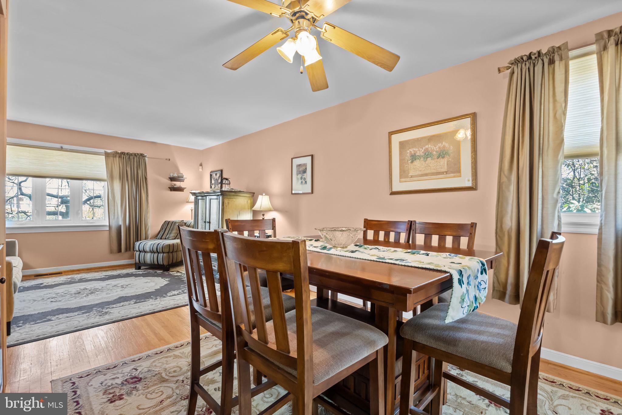 211 Rolling Hill Road Elkins Park, PA 19027 - Photo 14 of 41 a view of a dining room with furniture window and wooden floor