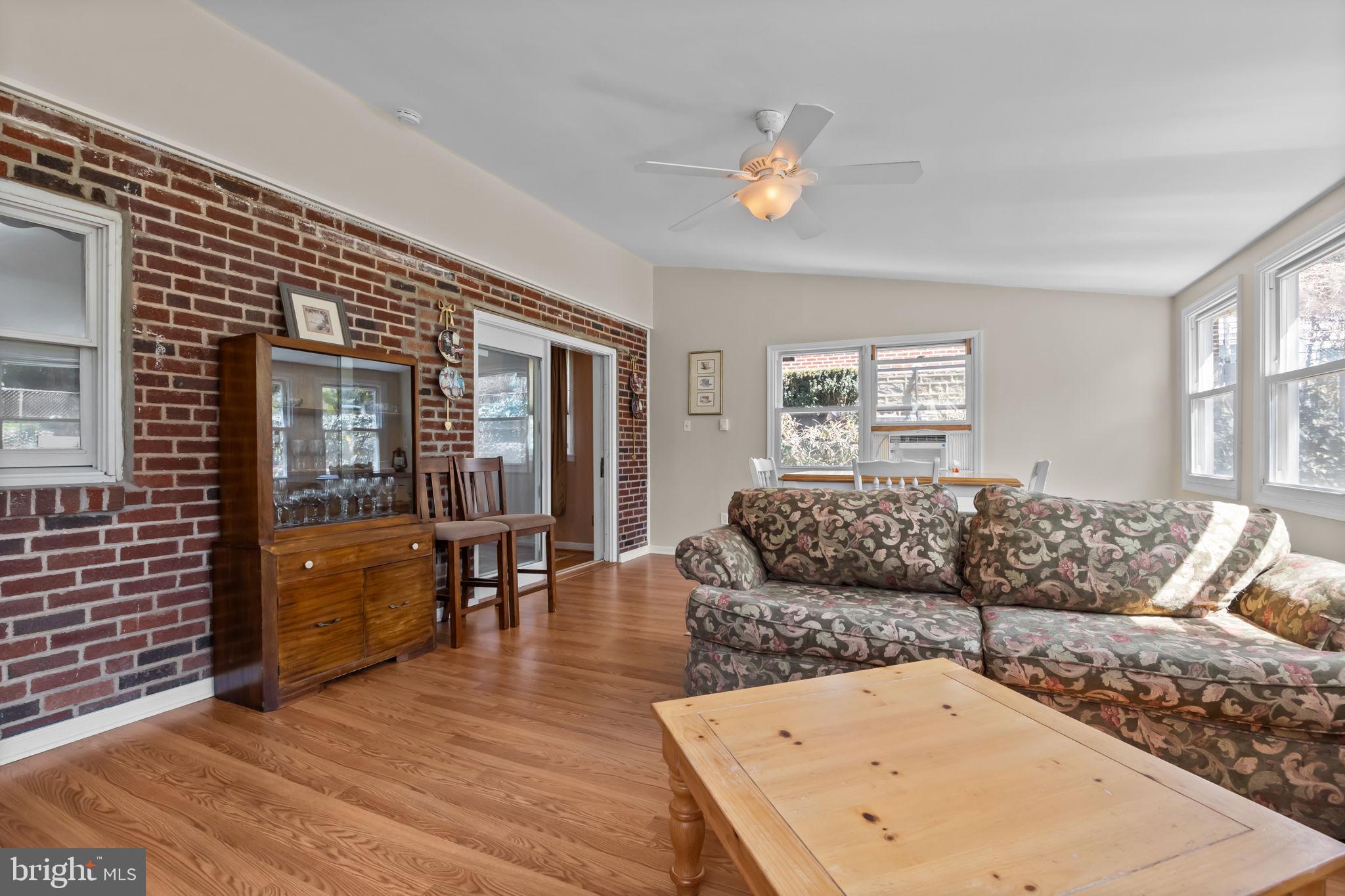 211 Rolling Hill Road Elkins Park, PA 19027 - Photo 17 of 41 a living room with furniture and wooden floor