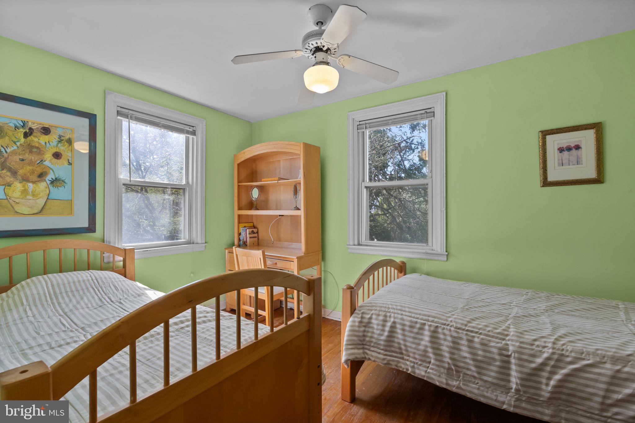 211 Rolling Hill Road Elkins Park, PA 19027 - Photo 19 of 41 a bedroom with a bed and window