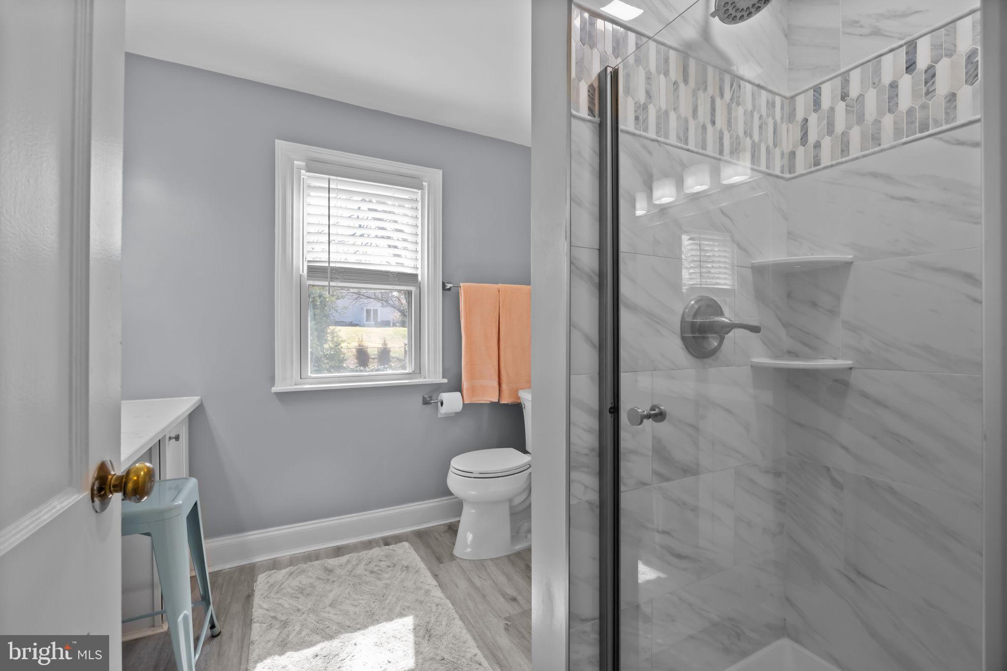 211 Rolling Hill Road Elkins Park, PA 19027 - Photo 26 of 41 a bathroom with a toilet and a shower
